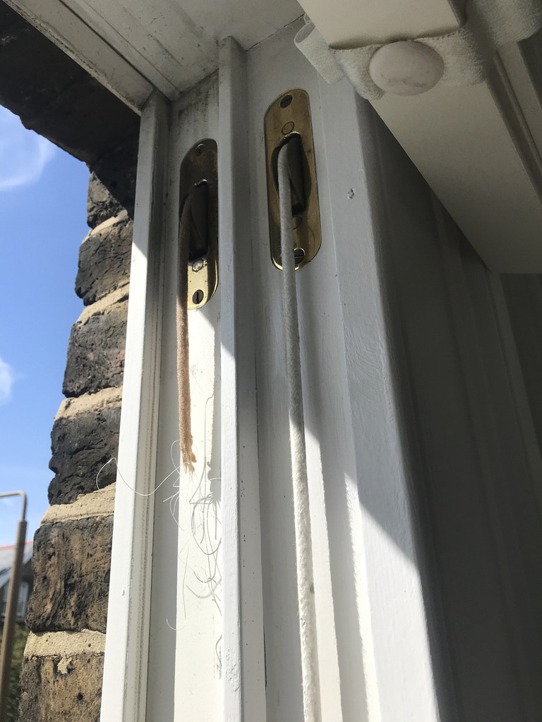 photo of a broken sash cord that needs to be repaird